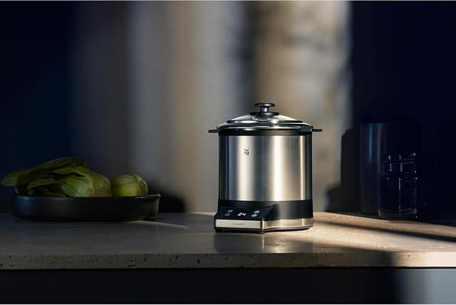 Detalle de WMF Küchenminis Reiskocher 220 W mit Lunch-to-go-Box, Cromargan matt – Mini-Dampfgarer für bis zu 1 l