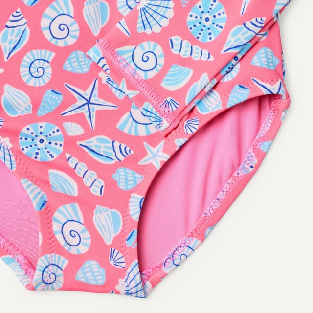 Detalle de Amazon Essentials Girl’s Rash Guard One-Piece Swimsuit (long-sleeve, centre-front zip)