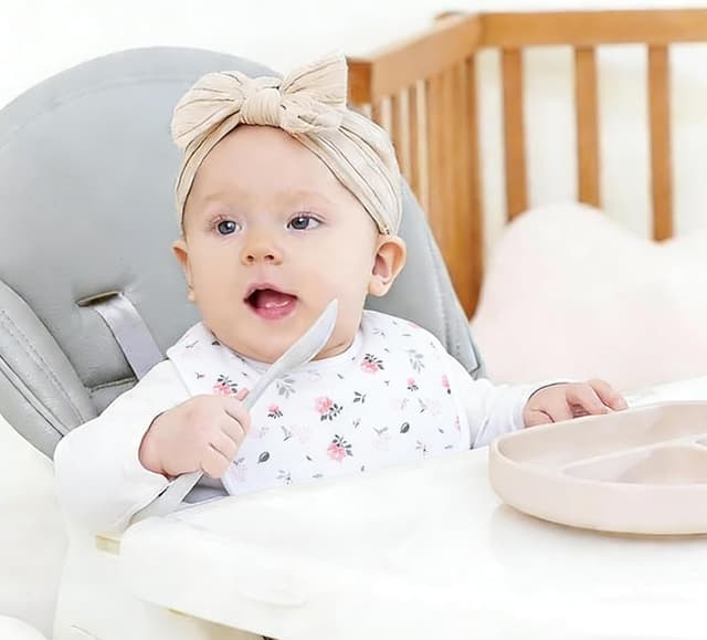 Detalle de Hakochia waterproof baby bibs (4-layer cotton) with adjustable snaps, 10-pack for 0–12 months