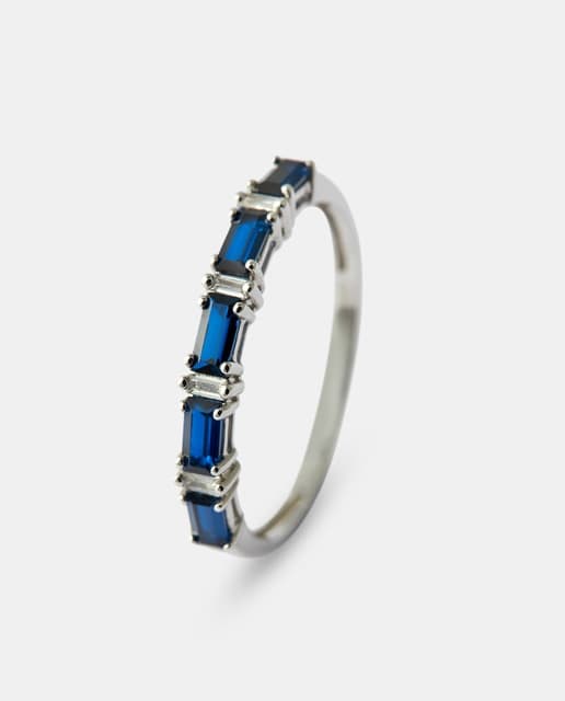 Detalle de El Corte Inglés Media alianza oro con diamante y zafiro 💍