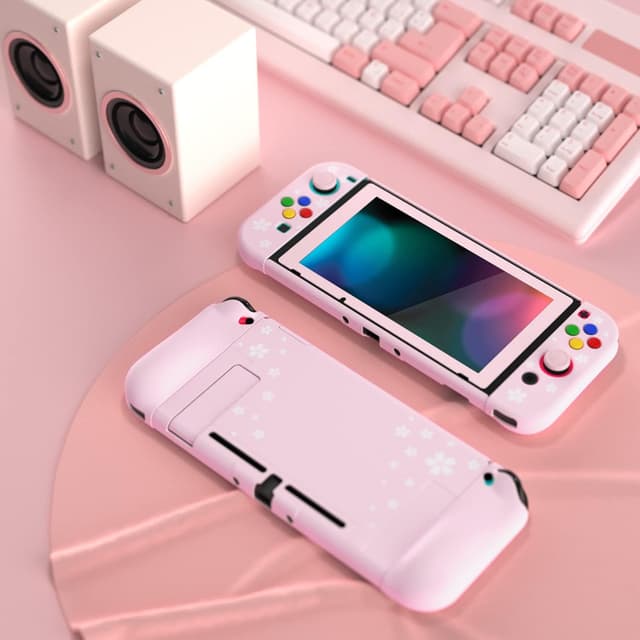 Detalle de Playvital AlterGrips Dockable Protective Case for Nintendo Switch (Cherry Blossoms Petals) with screen protector and grip caps