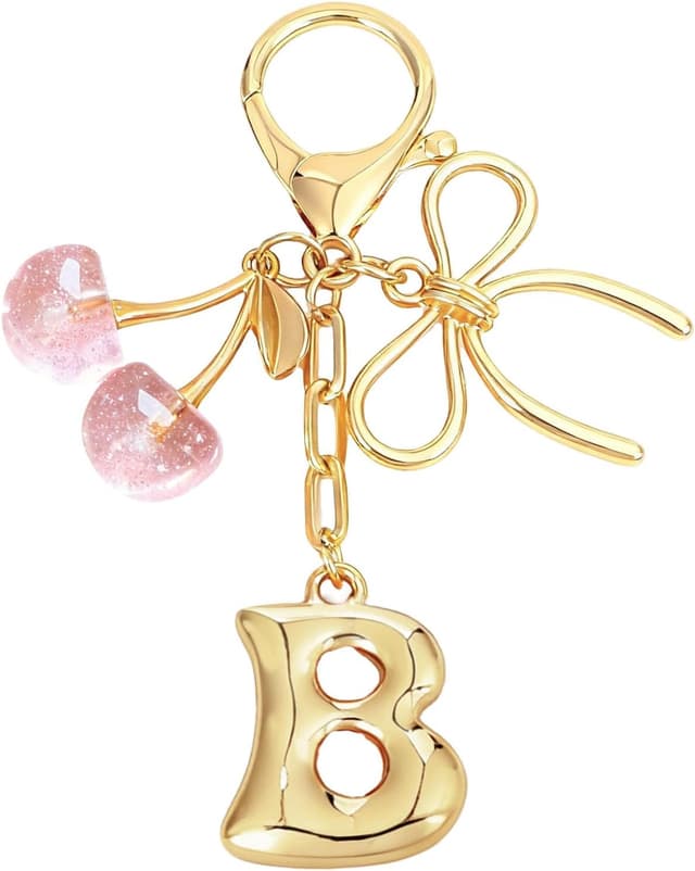 Detalle 2 de Snylcce Initial A keychain with bow & cherry charm in gold-plated metal