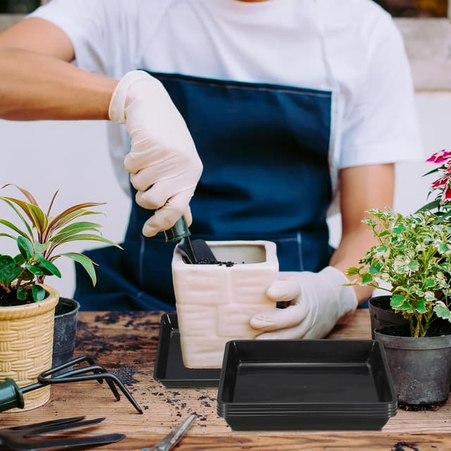 Detalle 2 de PATIKIL 9 inch square plant saucers (10-pack) in black plastic