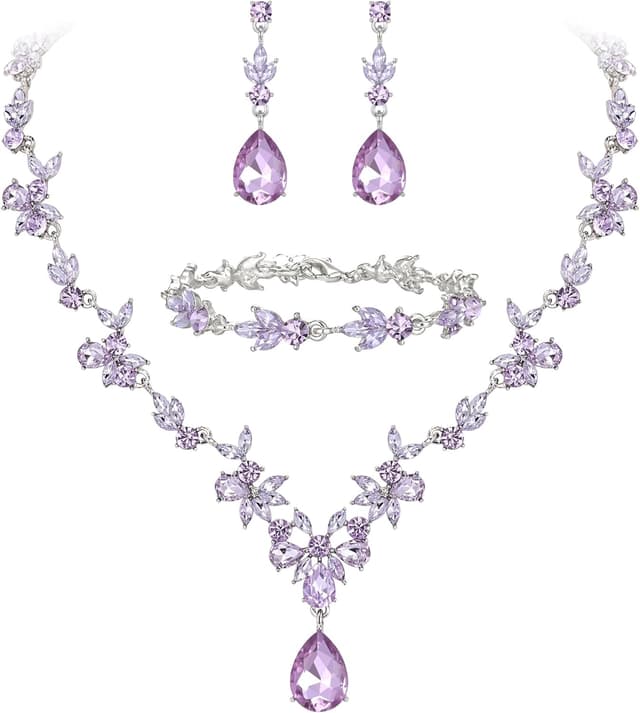 Detalle de Parure de bijoux de mariage Clearine : collier Y, bracelet tennis et boucles d’oreilles pendantes en cristal bleu