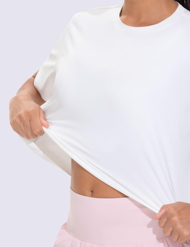 Detalle de THE GYM PEOPLE Haut court d’entraînement à manches courtes pour femme – coupe ample, polyester à séchage rapide