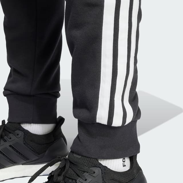 Detalle de adidas Uomo Essential Three Stripes French Terry Pant XL pantalón negro/ blanco