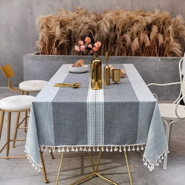 Detalle de SUNBEAUTY wipeable rectangular cotton-linen tablecloth (60% cotton, 40% linen) 140x240cm grey with tassels