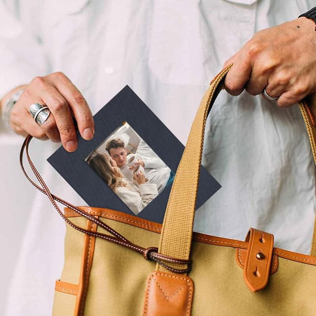 Detalle 2 de Kleines Fotoalbum Einsteckalbum 10x15 mit Fenster – 100 Taschen Mini Fotoalbum zum Selbstgestalten (Graublau)