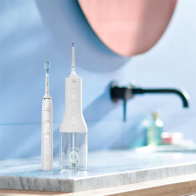 Detalle 2 de Philips Sonicare kabelloser Power Flosser HX3826/31 & DiamondClean 9000 HX9911/27 (HX3886/41) – Munddusche + elektrische Zahnbürste in Weiß