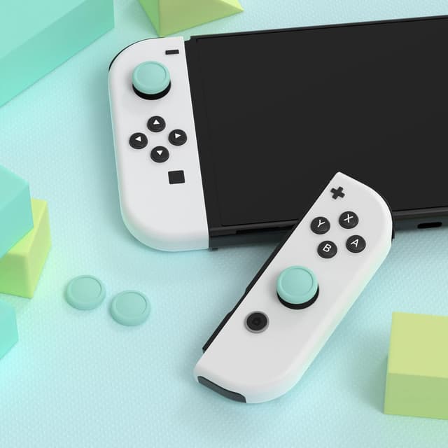 Detalle de eXtremeRate PlayVital thumb grip caps for Nintendo Switch (Switch Lite & Switch OLED) – Misty Green