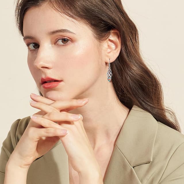 Detalle 2 de TUNGSTORY Ohrringe aus 925 Silber mit keltischen Hänge-Elementen und stabilisiertem Türkis