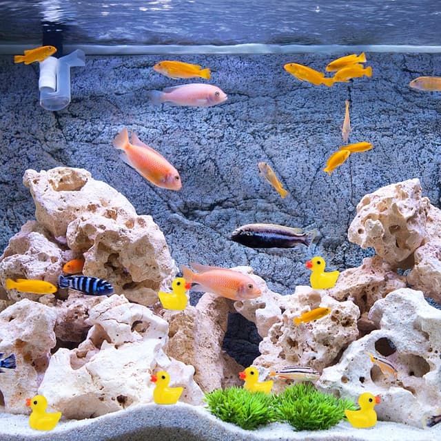 Detalle 1 de YsesoAi 100Pcs Mini Resin Ducks (Tiny Yellow Duck Figurines) for Dollhouse, Garden & DIY Decor