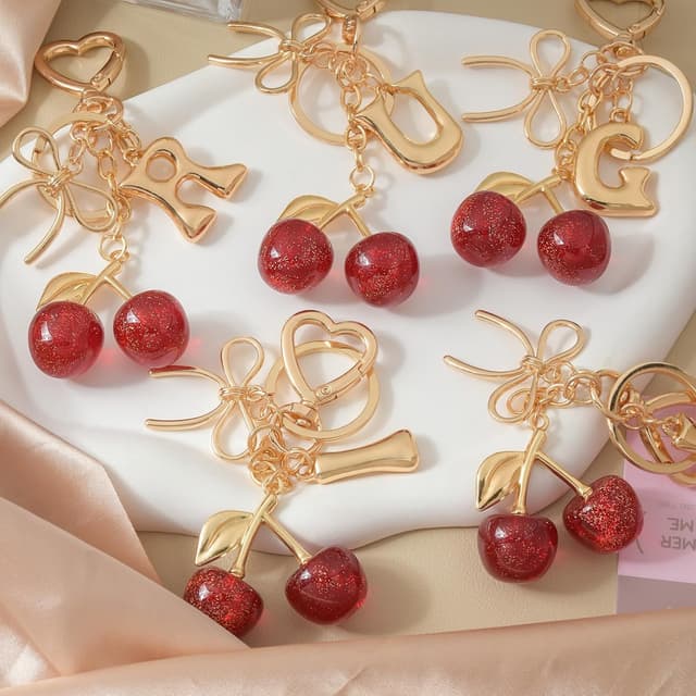 Detalle de Snylcce Pink Cherry Bow A-Z Initial Keychain with Crystal Accent