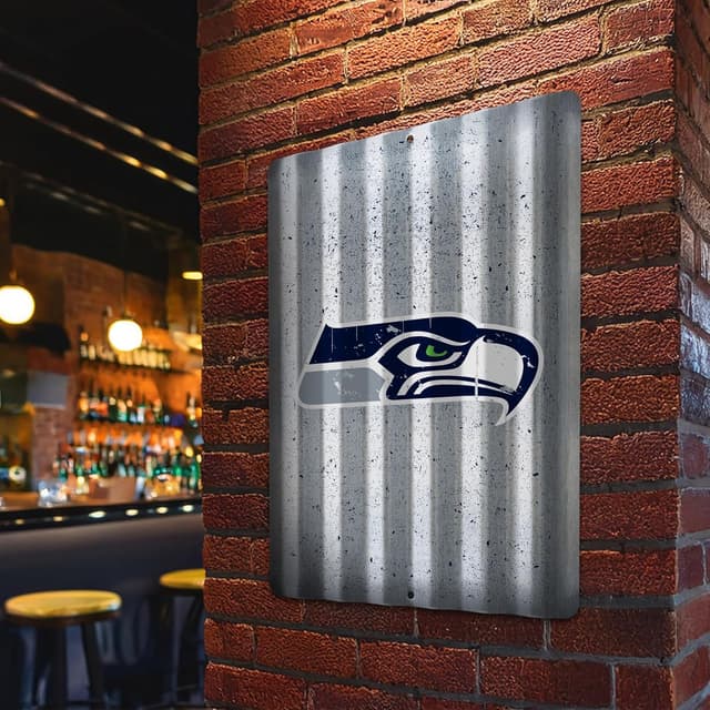 Detalle 2 de Rico Industries NFL Football 12" x 16" Tin Metal Roof Sign for Sports Fans