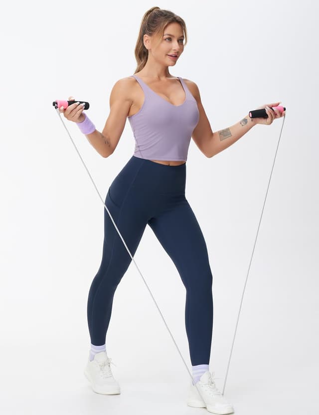 Detalle de THE GYM PEOPLE Pantaloni da yoga da donna a vita alta con tasche e controllo pancia