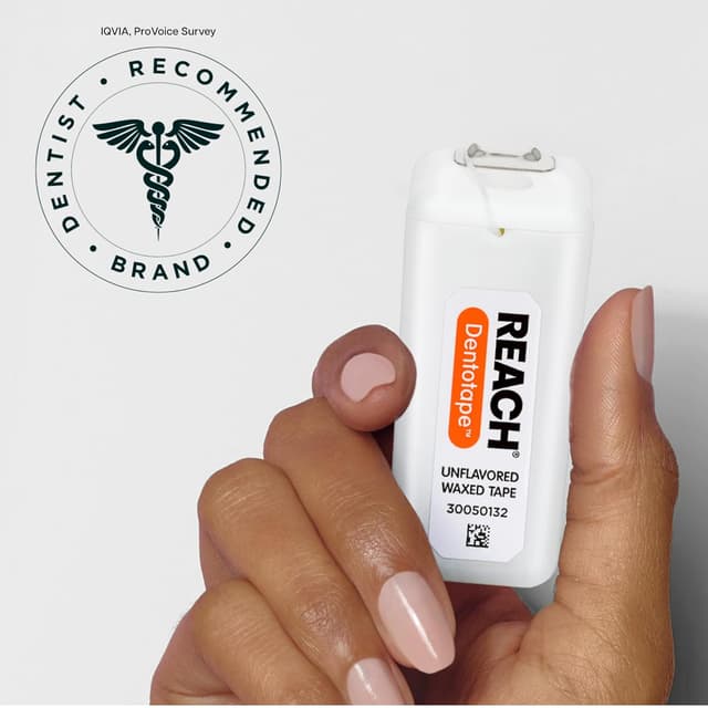 Detalle de REACH Dentotape Waxed Dental Floss Tape (Extra Wide, Unflavored) — Plaque remover for wide-spaced teeth, 6-pack (100 yd each)