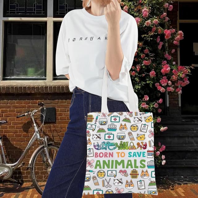 Detalle 2 de LEVLO Veterinarian Cosmetic Bag – cotton canvas zip pouch with “Born to Save Animals” print