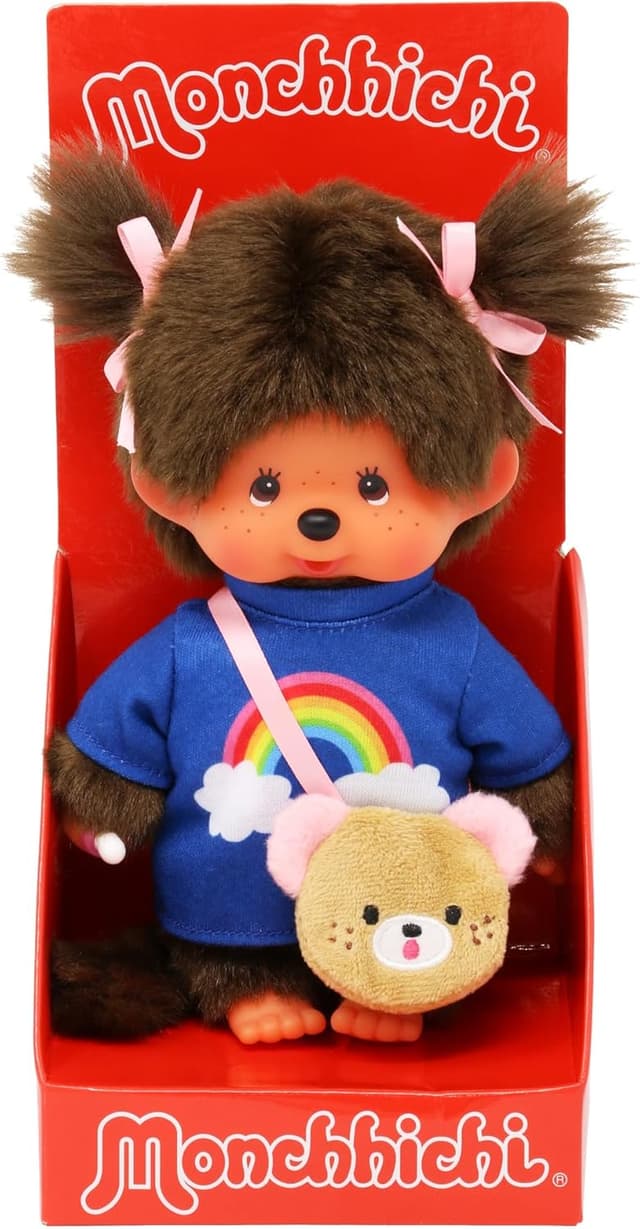 Detalle de Sekiguchi 233724 Monchhichi bambina con maglietta arcobaleno, borsa e fiocchi (peluche ~20 cm)
