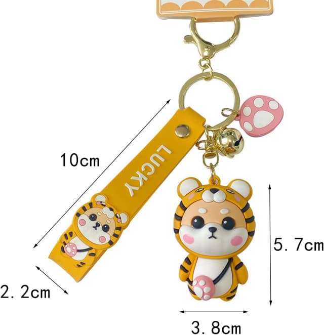 Detalle 2 de Porte-clés femme Shining crown au pendentif Shiba Inu (style fraise) en PVC silicone