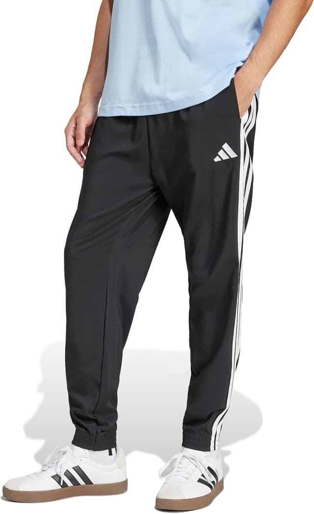 Detalle de Adidas Essential Three Stripes Woven Pant pour homme – pantalon de survêtement tissé à trois bandes