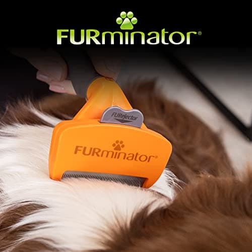 Detalle 2 de FURminator deShedding talla M para perros medianos de pelo largo