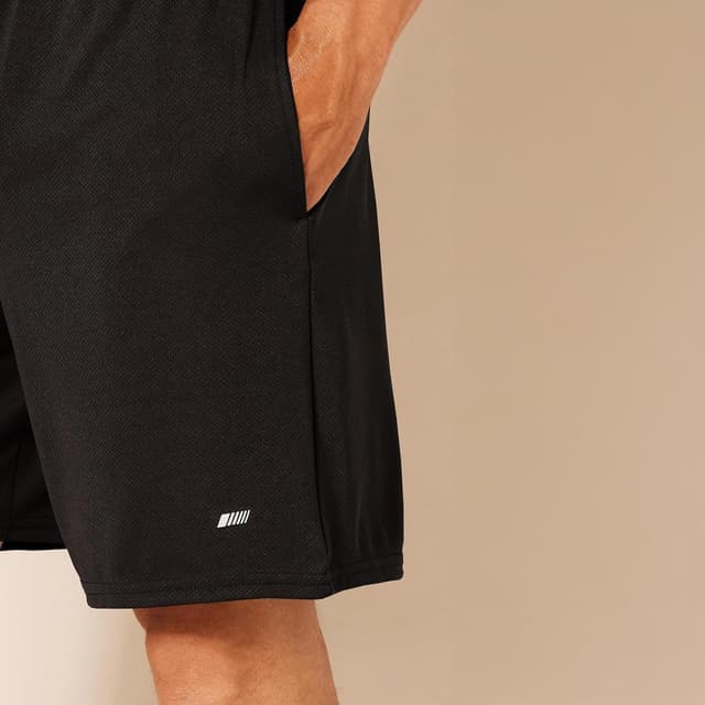 Detalle 2 de Amazon Essentials Short d’entraînement basket/gym en tissu technique, coupe ample homme (lot de 2)