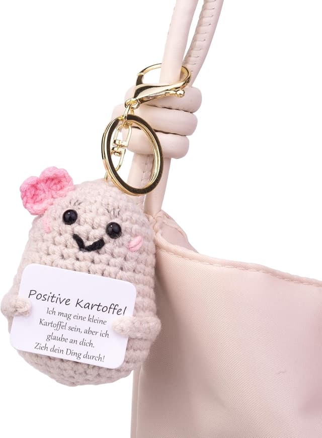 Detalle de Mwmoeen „Lustige Positive Kartoffel“ Pocket-Hug – handgestrickte Kartoffelpuppe aus Wolle als Motivationsgeschenk