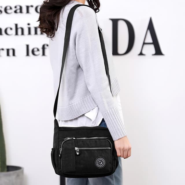 Detalle de LassZone Nylon Crossbody Bag for Women – Waterproof Multi-Pocket Travel Messenger Bag