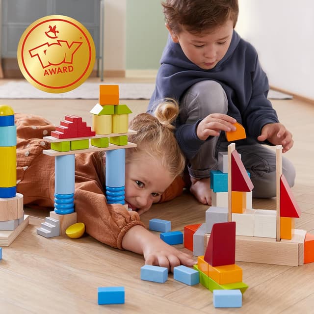 Detalle 2 de HABA Basis Holzbausteine 85 bunte Bausteine mit Baumwolltasche (ToyAward 2024) – für Kinder ab 1 Jahr