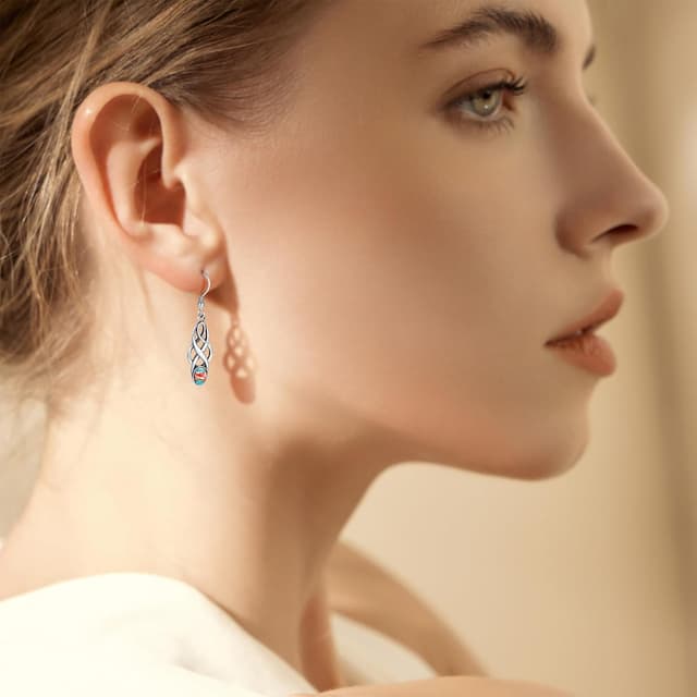 Detalle 2 de TUNGSTORY Ohrringe aus 925 Silber mit keltischen Hänge-Elementen und stabilisiertem Türkis