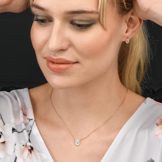 Detalle de Diamond Treats collier Khamsa Main de Fatma en argent 925 plaqué or rose, pendentif zircone bleu