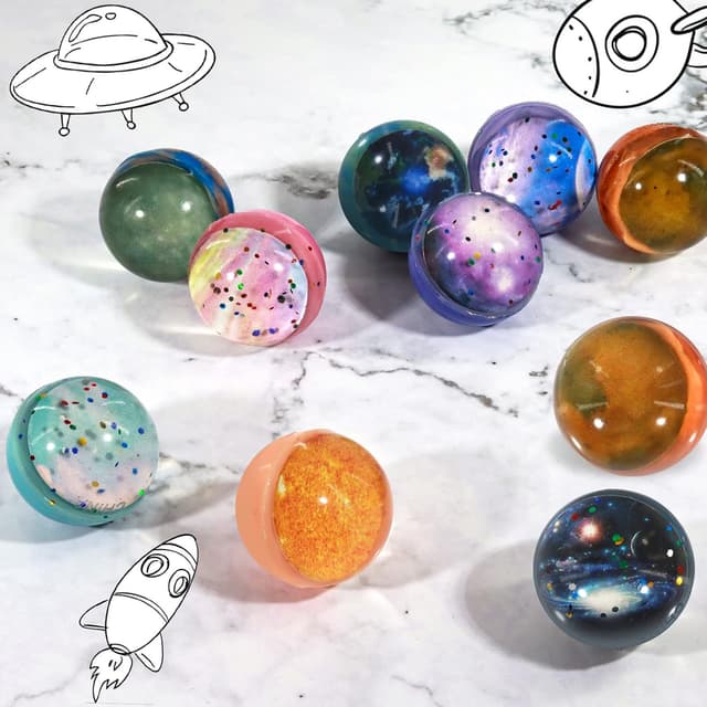 Detalle 2 de Annhao 30er Set Flummis für Kinder mit Weltraum-Motiven (32 mm)