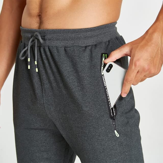 Detalle de ZOXOZ pantaloni sportivi uomo in cotone con elastico in vita e tasche con zip