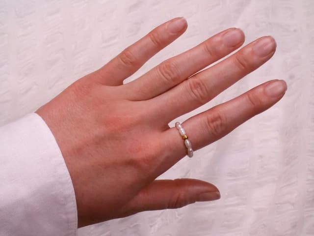 Detalle de BERGERLIN Reis Perlen Ring mit Goldperle S M L