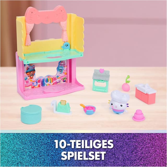 Detalle de Gabby’s Dollhouse: Der Film – DREAMWORKS GABBY’S DOLLHOUSE Portal Raum „Kuchis zuckersüße Sprinkleküche“ mit Spielfigur & Zubehör (ab 3 Jahren)
