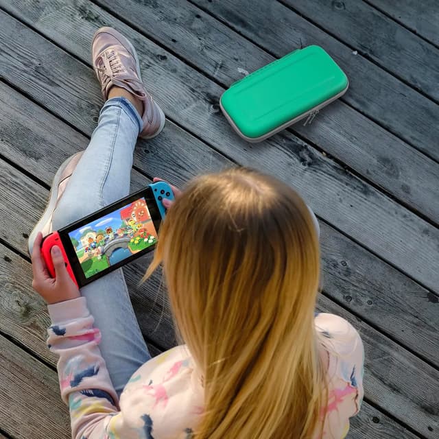 Detalle de Orzly Tragetasche für Nintendo Switch OLED – Hülle mit Zubehör- & Spiele-Ablagefach, Geschenkverpackung