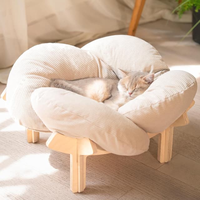 Detalle de CheerPals erhöhtes Katzenbett in Blumenform (55 cm) – großes Katzensofa mit hochelastischem Weichkissen