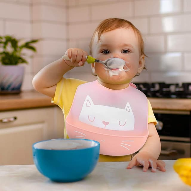 Detalle de SLOSH bavaglino in silicone impermeabile con tasca raccoglipappa (6 mesi–6 anni)