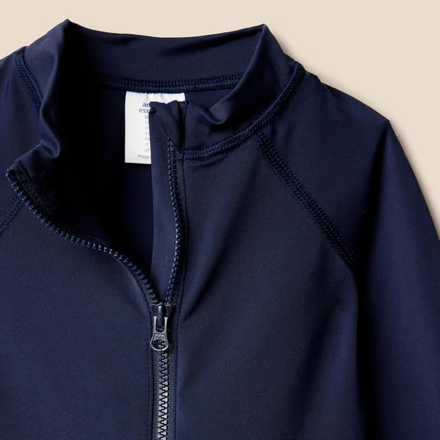 Detalle de Amazon Essentials rashguard unisex a maniche lunghe per bambini e ragazzi