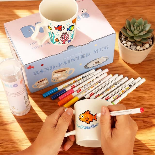Detalle 1 de Tassen Bemalen Set mit 12 Keramikstiften