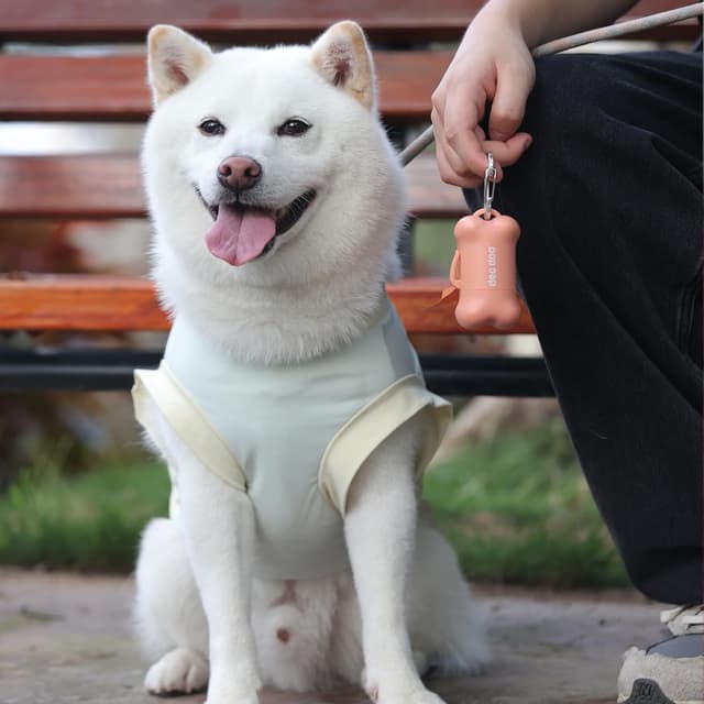 Detalle 2 de Hundekotbeutel biologisch abbaubar mit Henkel & Spender – 720 Stück (60 Rollen) mit Duft
