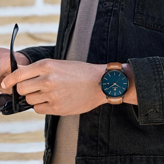 Detalle 2 de CHEETAH Minimalistische Herren-Uhr mit Quarzwerk, Lederarmband und Datumsanzeige (3 ATM)