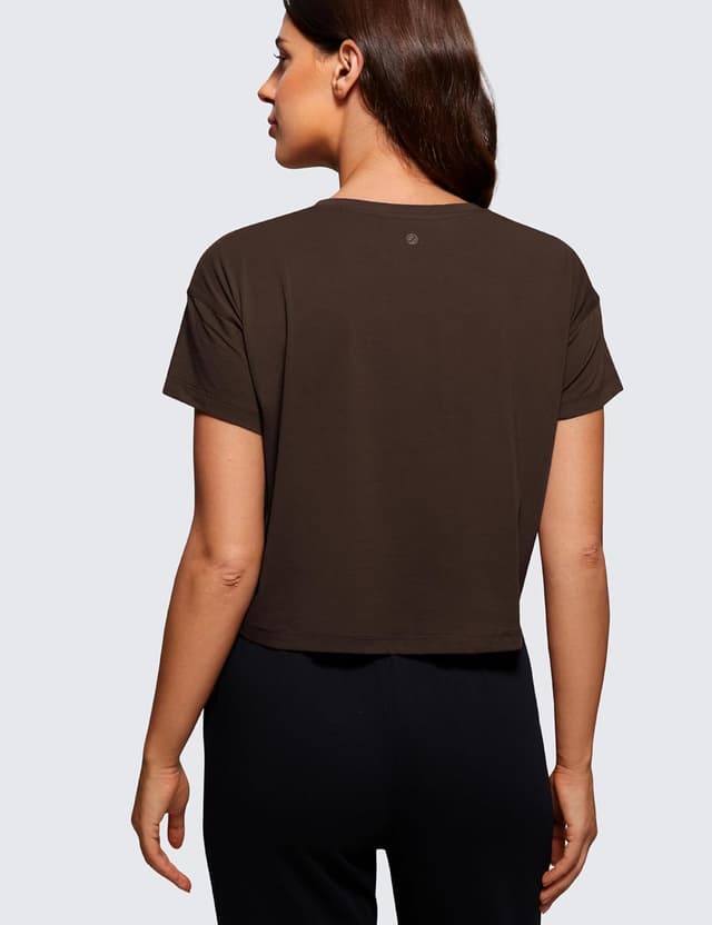 Detalle de CRZ YOGA da donna in pima di cotone: maglia da allenamento a manica corta sciolta