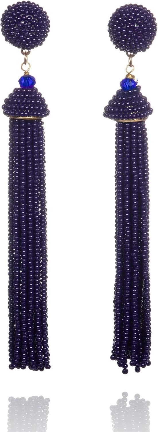 Detalle de Zavana orecchini lunghi boho chic con nappine e perline viola-blu