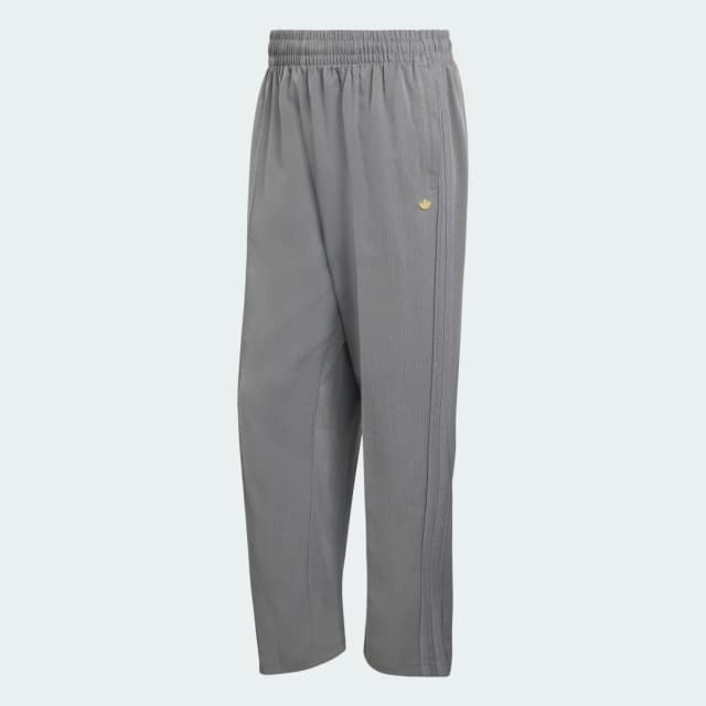 Detalle 2 de adidas PANTALÓN HOLGADO FIREBIRD PINSTRIPES gris: comodidad con caída suelta