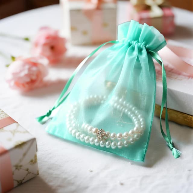 Detalle 2 de jijAcraft Türkis Organzasäckchen 10x15 cm