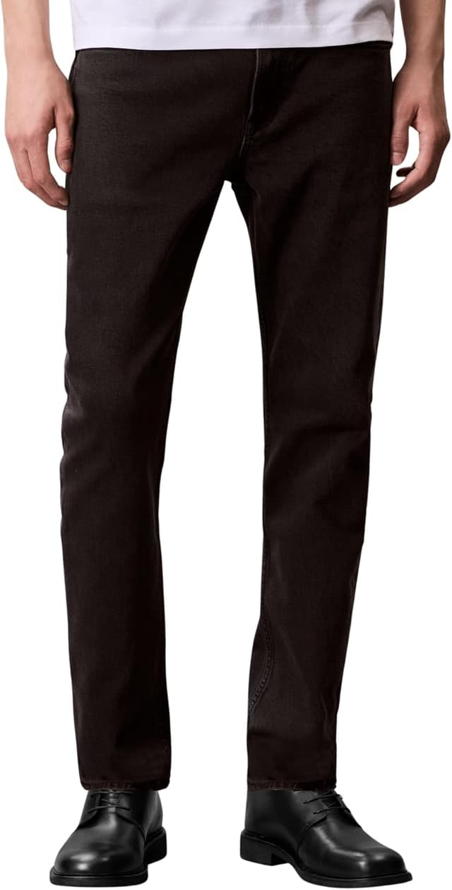 Detalle de Calvin Klein Men’s Black Oil Slick Slim Tapered Fit Jeans