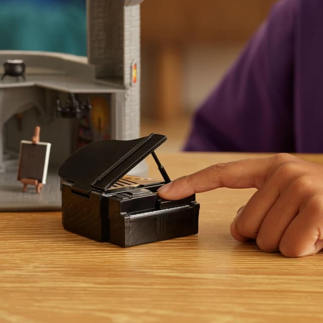 Detalle de Super Mario Galaxy Movie Deluxe Bowser-Schloss-Spielset (30 cm) mit Bowser-Figur, Klavier und Bonsai-Baum