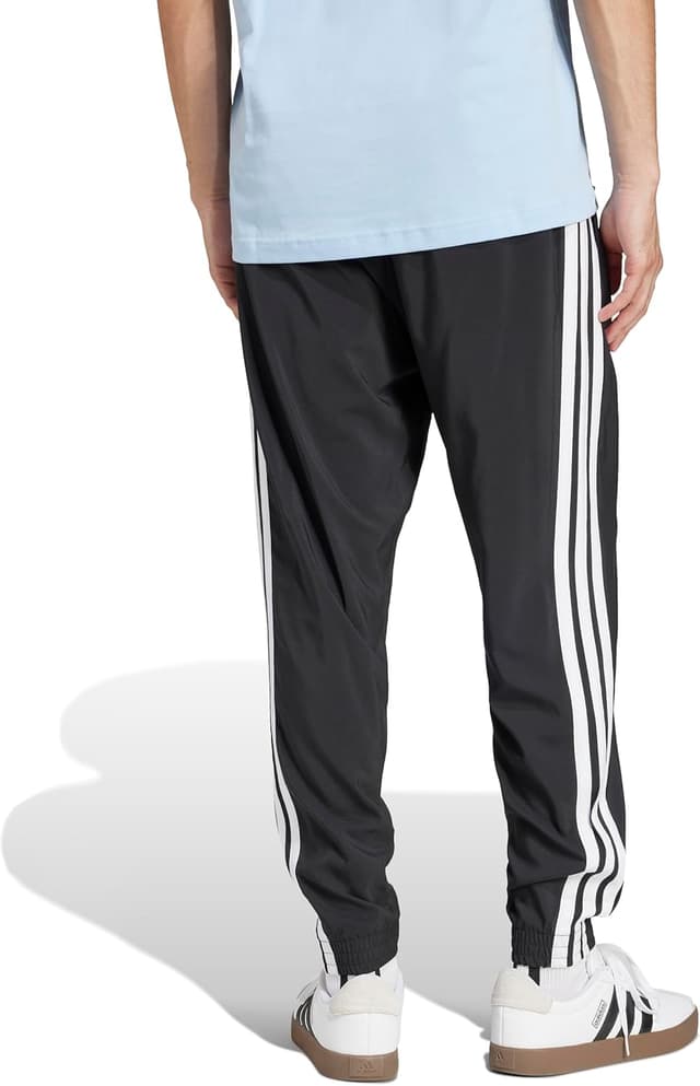 Detalle 2 de Adidas Essential Three Stripes Woven Pant pour homme – pantalon de survêtement tissé à trois bandes