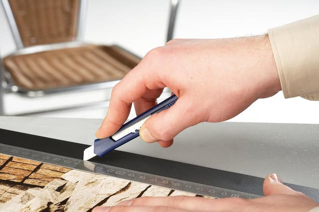 Detalle 1 de Irwin 10506544 : cutter à lame sécable de 18 mm avec glissière autobloquante